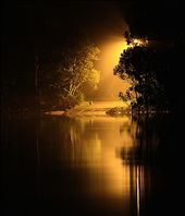 A street light shining down on the cable ferry ramp. The ferry takes cars across the Hastings river at Port Macquarie.: by garyd0014, Views[453]