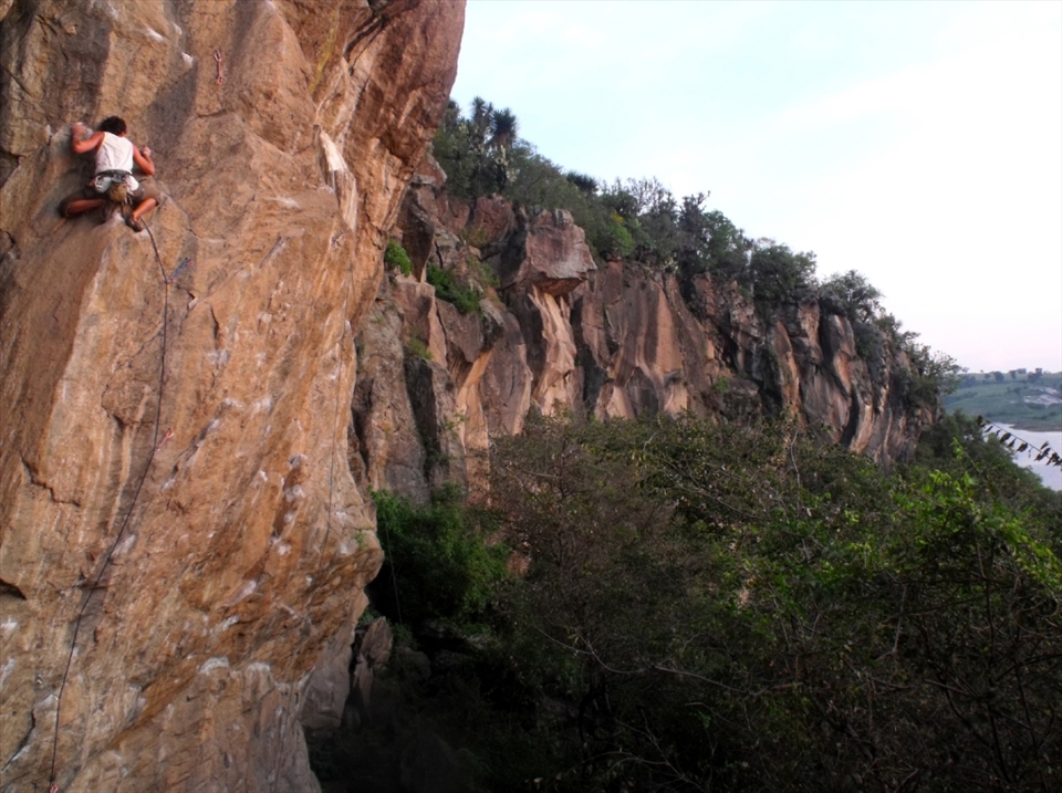 An austrian climber giving his best at the local crag in Puebla, Mexico. It is hard to get a dramatic picture that captures the feelings while rock climbing...