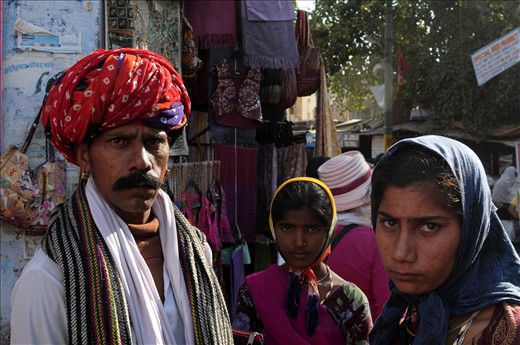 A young man and his daughters from the Indian countryside in Rajasthan