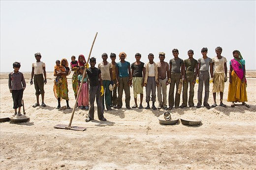 Ill Equipped workers (Agariyas) come from surrounding areas or move to the the Little Rann as labourers for the season, working in one of the harshest environments imaginable. A few have gumboots but most were were working in poor footwear, some in flip flops, some just barefoot with cracks and cuts on their feet. It's hot, heavy, hard work. Many Agariyas suffer with ill health, skin lesions, breathing problems and blindness.