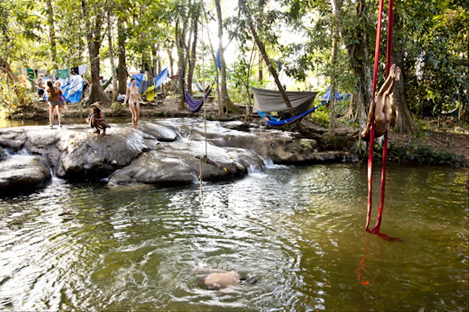People having fun by the river