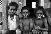 Three Tiwi's having a giggle at me taking a photo of them as they play outside, as they had never really seen one before or had photographs taken of them. The closeness within the Tiwi culture and community, is one that is unexplainable or replicated in the western society.: by georgiamae, Views[142]