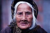 Capturing the older generation of Vietnam (Han oi). This lady walked the street alone and didn't speak english, yet let me take a photo of her. Her eyes and face create a very strong photograph and capture the rawness, as if her face tells many stories over many different times in this ancient city.: by georgiamae, Views[172]