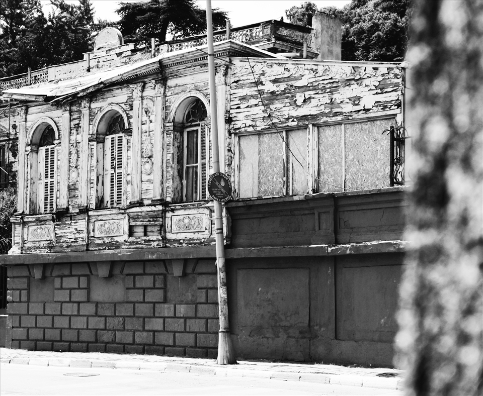 an old house at Istanbul, Turkey. It was there between other buildings, and nothing looked as old and beautiful as that one, you're kinda able to imagine the life that was once lived in that home.