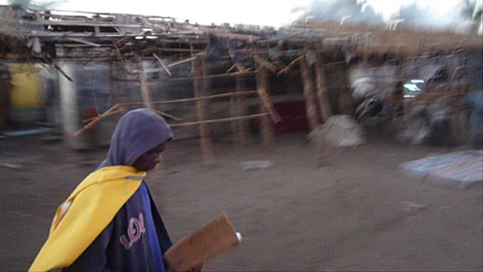 Beira Mozambico 2012 - Man reading at the market place