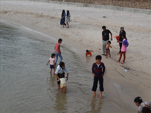Locals enjoying the beach just prior to sunset