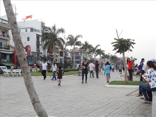 Children playing with kites for Chinese New Year on Riverside