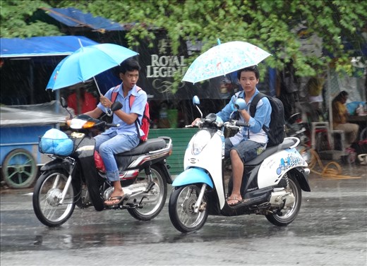 Friends riding side by side and chatting