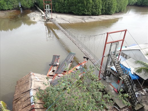 View from top of tower looking down on the walkway and swing bridge