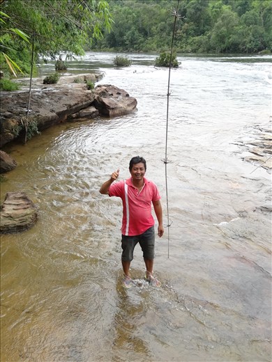Harry my tuk tuk driver at the top of the waterfall