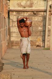 Man carries water into the temple for Puja.: by gisellerenata, Views[259]