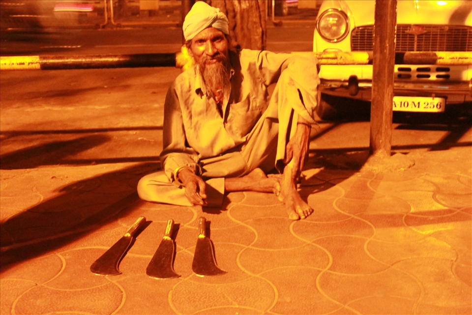 A street peddler's game, Mysore India.
