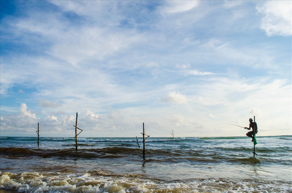 An elusive stilt fisherman keeps alive a dying art