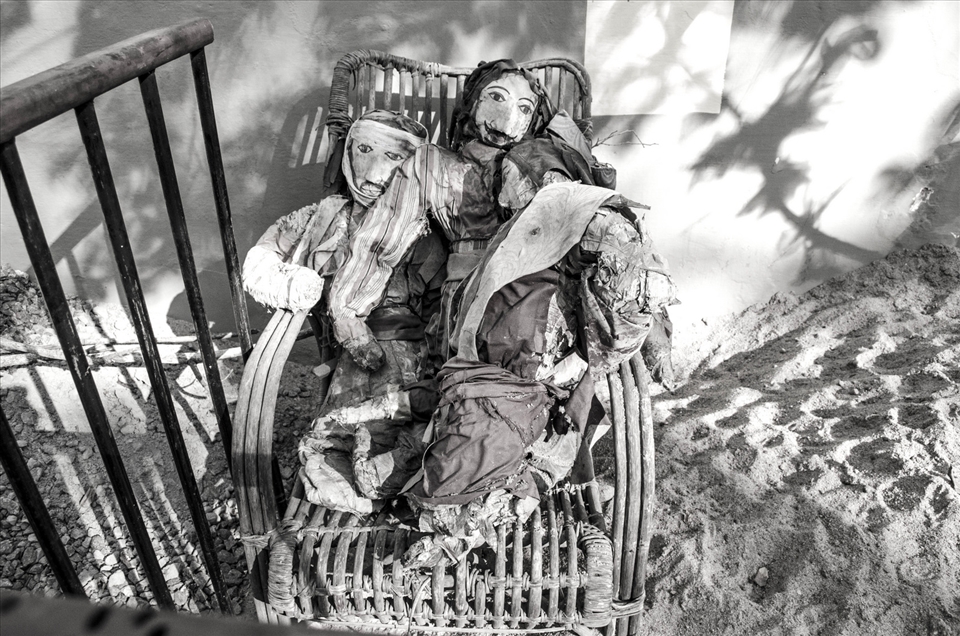 Forgotten in a street corner, the ragged dolls have breathed life in a world of their own. Pondicherry, India