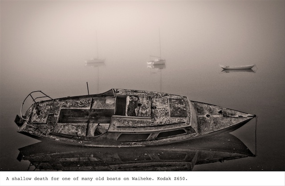 A shallow death for one of many boats on Waiheke.  Kodak Z650