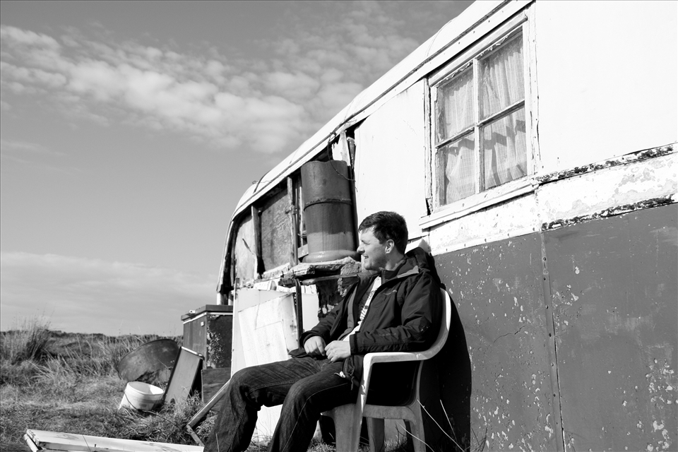 Miles into the moors you find these empty shielings: Lost capsules of life. My friend sits on a garden chair, sitting outside an empty shieling made from an old bus. I have no idea how this bus got out here without wheels, miles into the edge of nowhere.