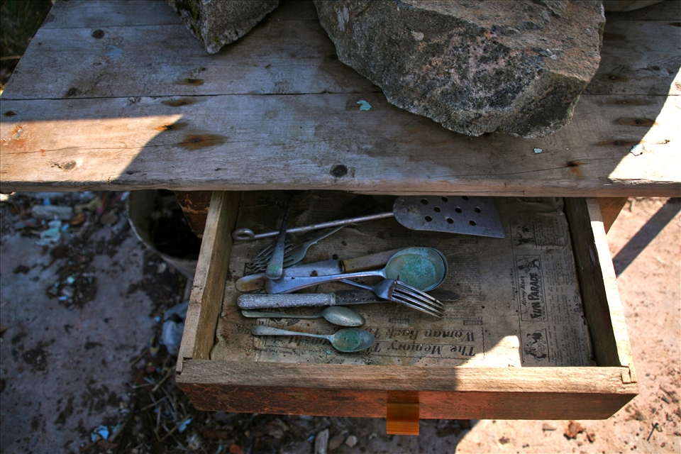 This shieling lost its walls but this desk, with perfectly tidied cultery, remains. The headline of the paper lining says 'the memory' - the paper was unbelievably old. A sign of life and lack of life in one: The contradictions of this amazing, stark, island.