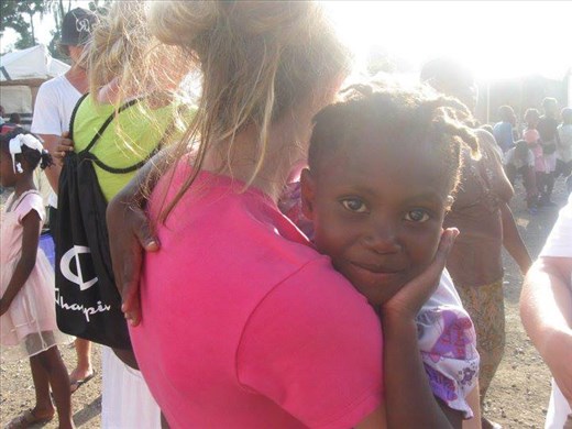 A beautiful Haitian girl giving her best genuine smile.