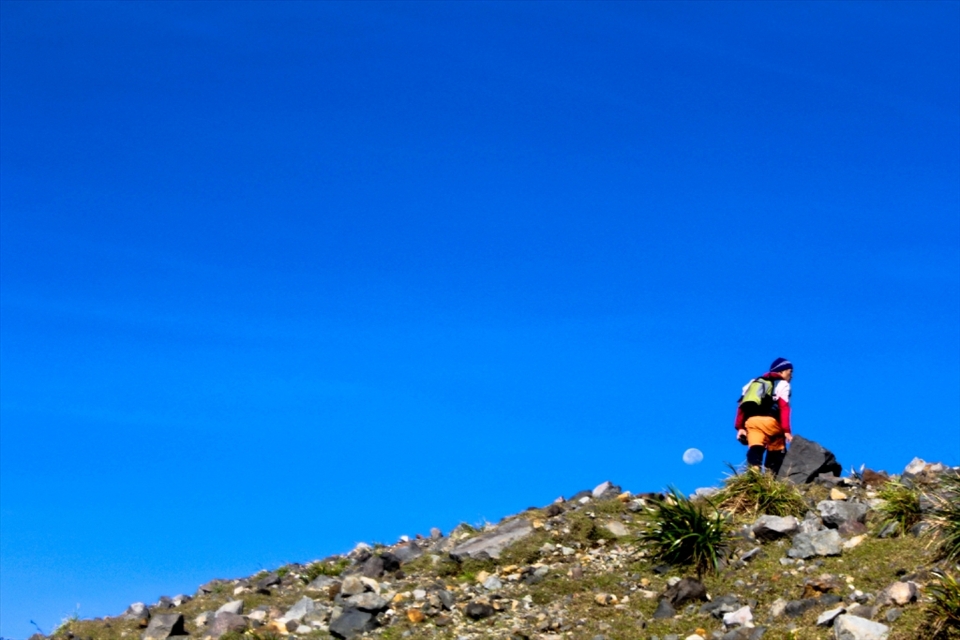 Our climb guide getting nearer and nearer to the peak. He is now higher than the moon. As we all aspire to be.