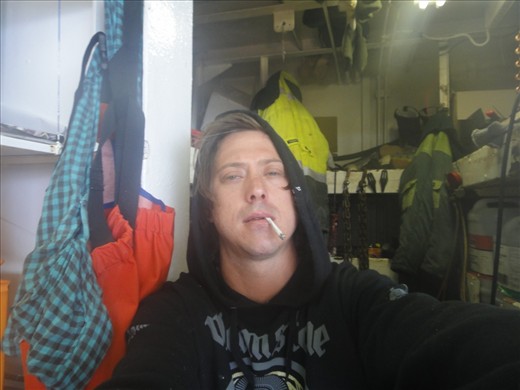 this is a self portrait, on the backdeck somewhere at sea.