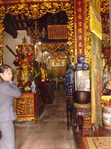 inside temple - people praying 