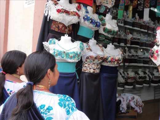 Local girls eying of a new blouse.