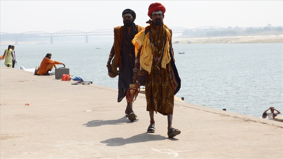 Sadhus taking a walk down the Ganges
