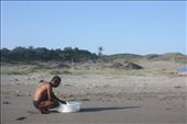 Fisherman checking for small fish he grow and eventually sell. He wasn't lucky that day, he tells me. But was quick to add, that tomorrow is another day.: by gmarcelang, Views[277]