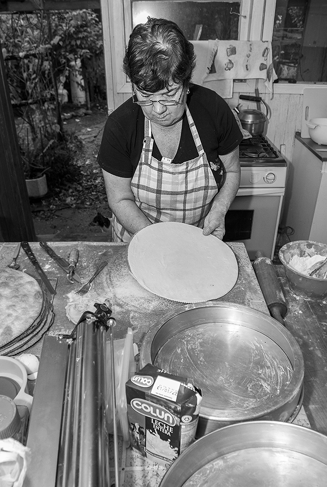 German descendants like to cook cakes and pies as a everyday desert. This lady is preparing a dough for an apple pie.