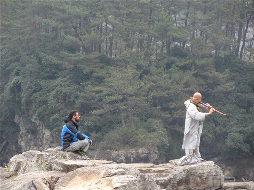 Up close & personal with a Buddhist Monk at the Jusangjeolli Cliffs in Jeju-Do.  