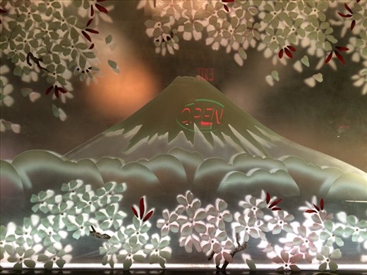 Fuji-San at sunrise? Well, open sign gives it away.