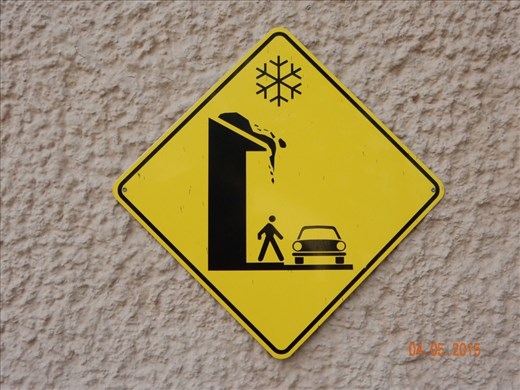 The black goo coming off the roof is re miscreant of the black blobs in Howls Moving Castle 