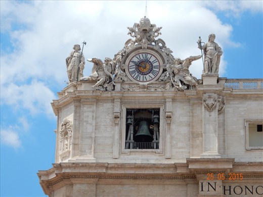 Bell and upper portion of Berninis colonnades at St Peters