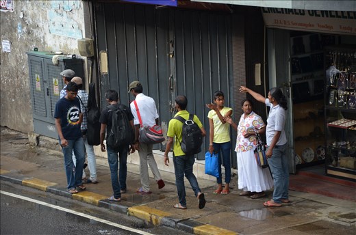 On the street - Getting directions from a shop owner