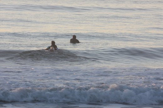 Early morning surfers