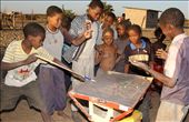 The Bushmen kids dont have recreational facilities or toys. Hence they become innovative. Here they are seen playing a home made game of pool.: by goddy, Views[1274]