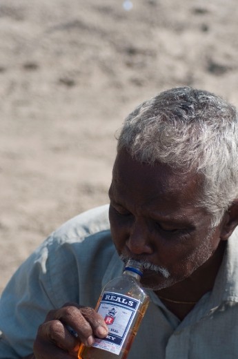 Fhiskey - Nanu Redkar. Fisherman. Has been fishing since 30 years, but due to frail body and old age, fishes near the beaches just for his wife and son. Happy to give fishing lessons if you tell him you are a whiskey fan. Sipping on some whiskey has been his oldest and the most important fishing ritual which he strictly follows before stepping in to the waters.