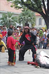 The man shows fake anger to a child in a Kuda Lumping Show: by goodmorningdew, Views[545]