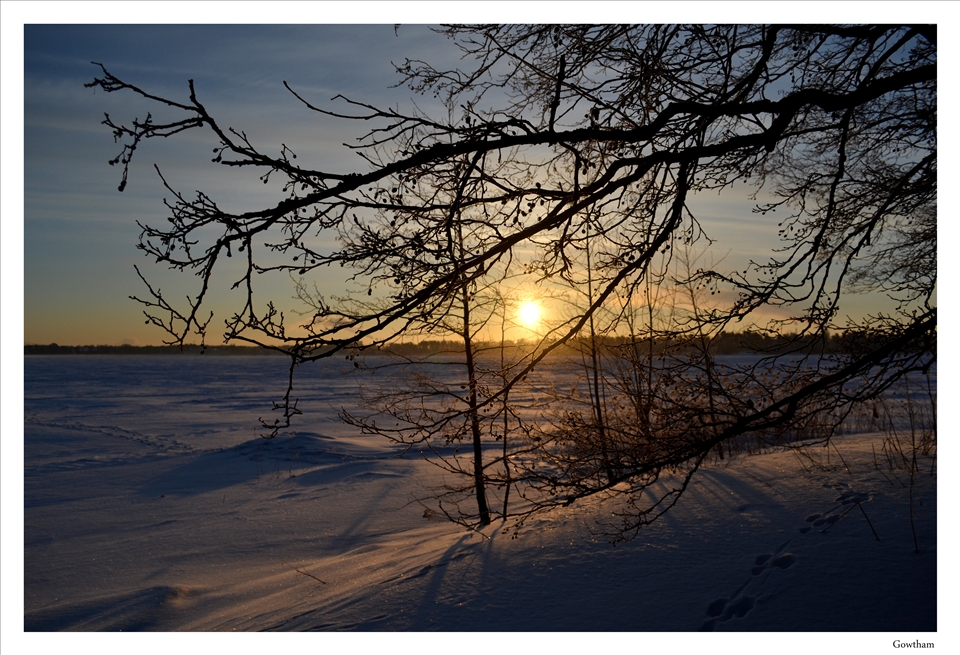 An early morning sunrise over frozen sea - Espoo, Sothern Finland.