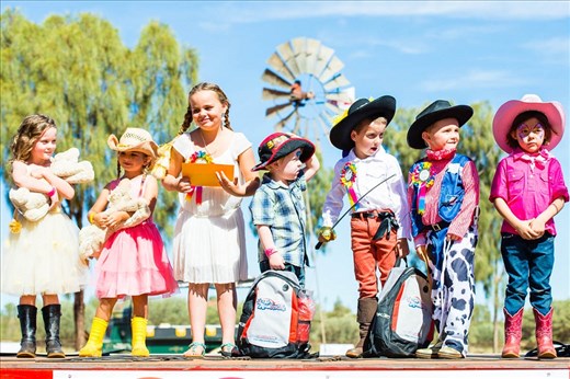 Fashions on the field is always a memorable experience in the outback. The local kids are up on stage showing off their best outback attire.