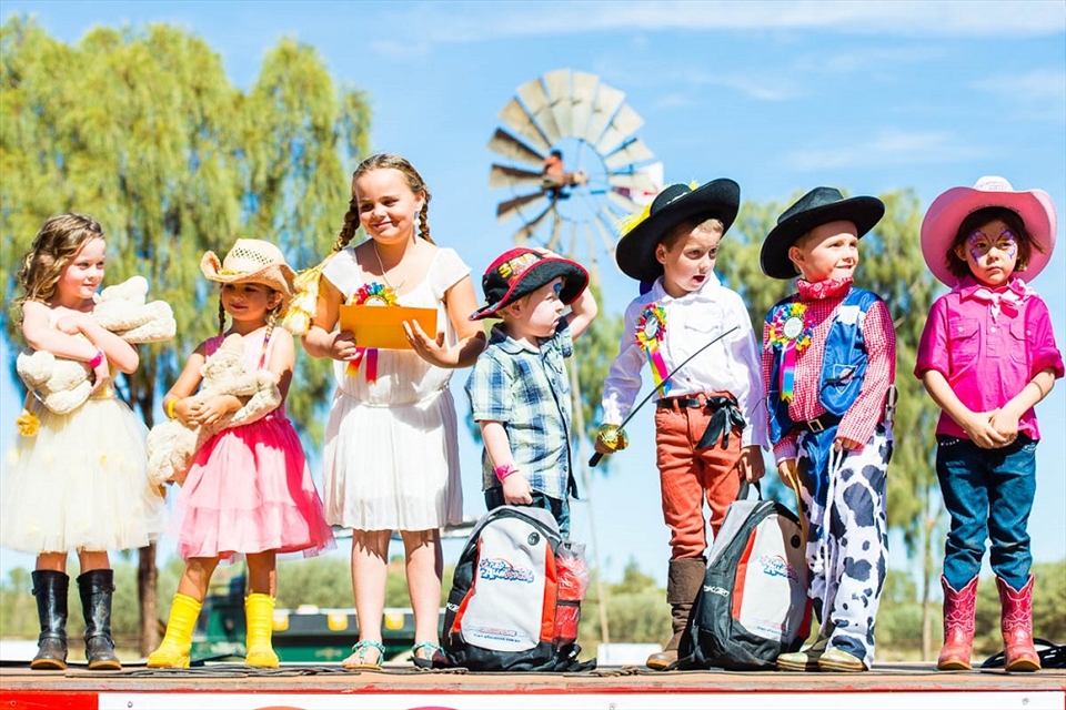 Fashions on the field is always a memorable experience in the outback. The local kids are up on stage showing off their best outback attire.