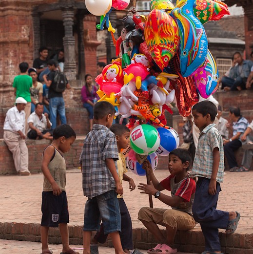 Balloon Mafia.  In the west we refer to Adam Smith and John Maynard Keynes.  Over here it's a little more complicated.  Ask yourself, if your child had to work to survive, would you be proud if he was an entrepreneur, diligently leading his little motley crew? 