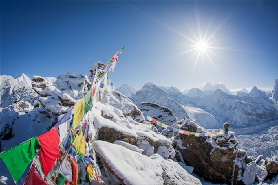 Sunrise Over Everest. Taken from the summit of Gyoko Ri (17,585ft) about half way through a twenty day expedition around the Solu Khumbu region in Nepal. In a season that saw much tragedy, many say as a result of the mountain's commercialization, at that moment we understood it's draw for so many people, despite the risks.  It's on the backs of the Nepali people that we were able to experience this incredible sight. 
