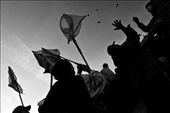 A group of Tenggerese is waiting for the offering thrown by the Hindunese to the Crater of Mt.Bromo using the net to ease the catch. East Java, Indonesia.: by graver_dusk, Views[382]