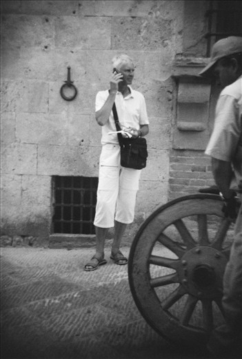 Our tour guide Christopher discusses on phone plans for the cinque terre walk