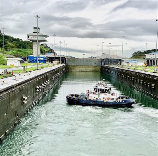 An escort into the first set of locks, Panama Canal
