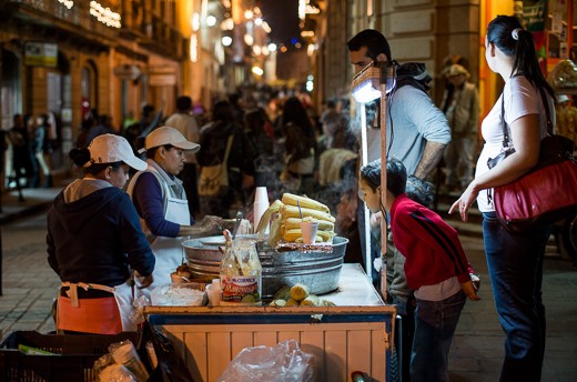 Elotes, the perfect appetizer to walk the streets at night.