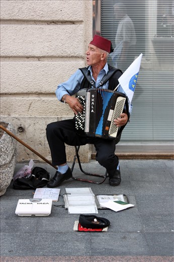 The music of life - a doctor in former Yugoslavia now a street artist in Bosnia