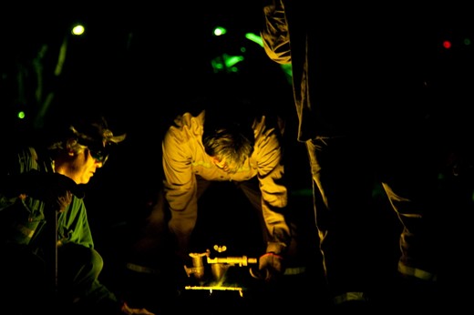 A team of railorad workers struggle to get the job done in time, in the suburbs of Buenos Aires in a hot summer night.