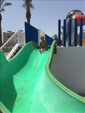 Slowest slide in the history of water slides! He actually had to push himself to get down the slide.: by guild_family_of_3, Views[347]